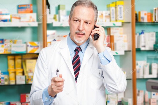 Senior reviewing prescription drug costs with a Medicare advisor.